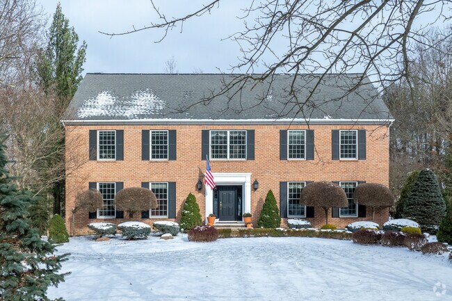 Colonial-style homes are a common architectural feature throughout Mayfield’s neighborhoods.