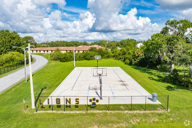Students enjoy outdoor play on the sports courts at Classical Preparatory School.