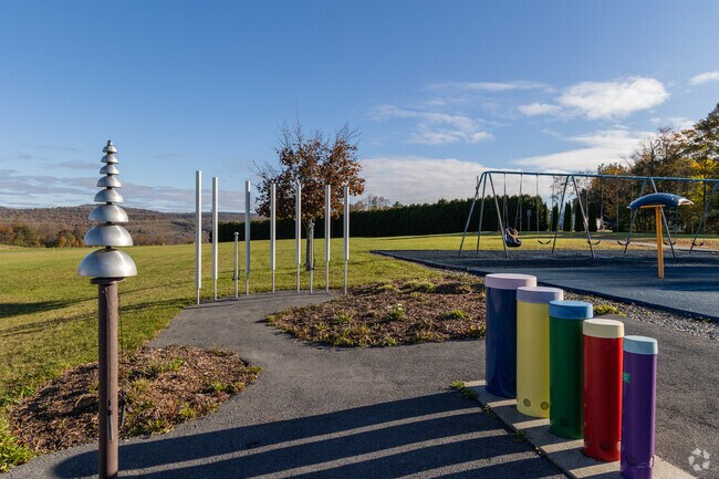 The kids love Lois's Music Garden at Cogan House Playground.