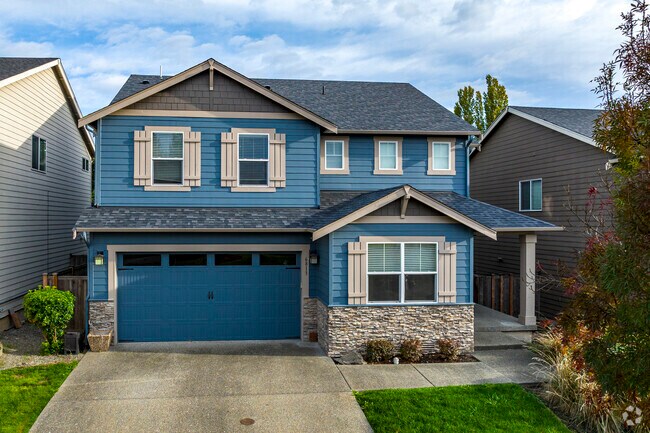A modern cottage sits in the urban residential area of Fife Heights, Tacoma.