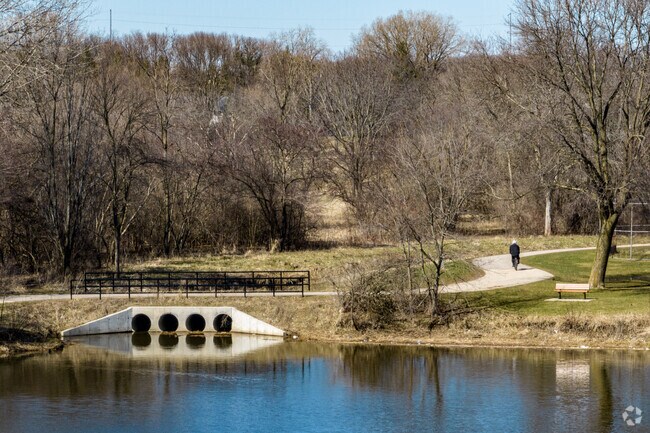 The pond sits along a bike path at Greentree-Chapel Hills Park.