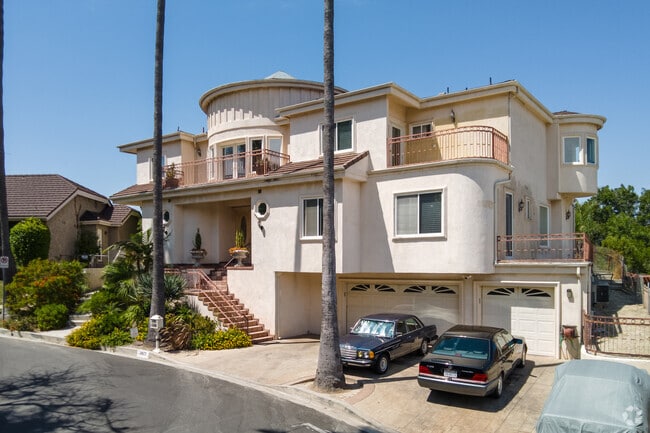 Sherman Oaks elegance: A three-story mansion boasting a spacious three-car garage.