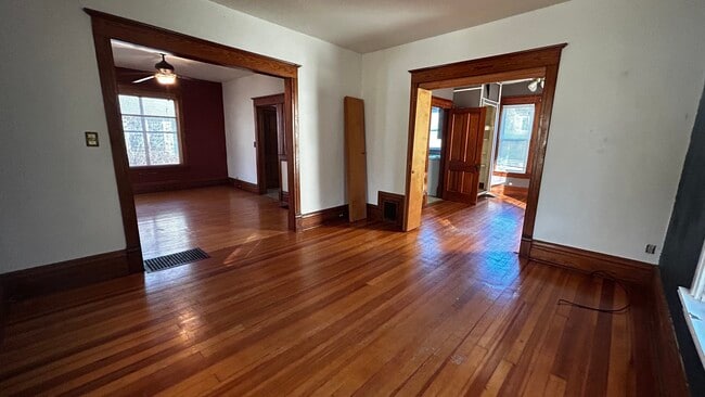 Living room (dining room left; bedroom right)