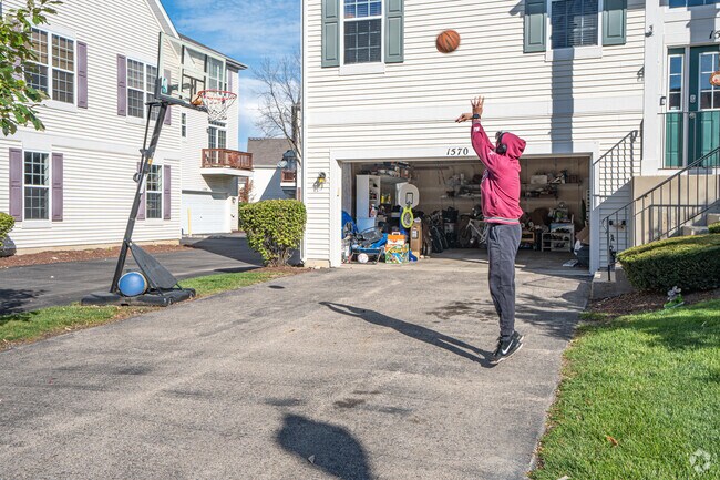 Townhomes in Remington Trails feature long driveways and low-maintenance landscaping.