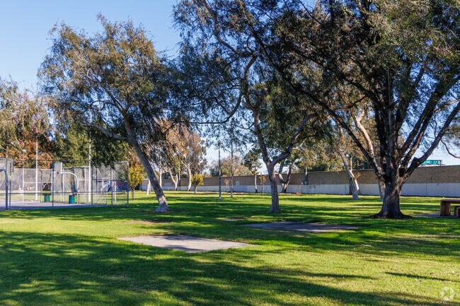 Green space and mature trees at Coolidge Park.
