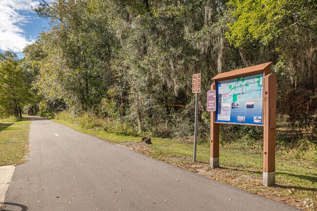 Baldwin's Jacksonville-Baldwin Rail Trail where residents enjoy paved paths through nature.
