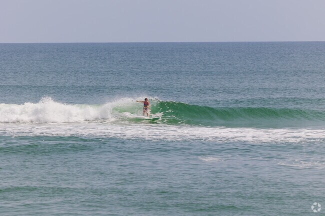 Locals love surfing the beach breaks in Waves on the Outer Banks.