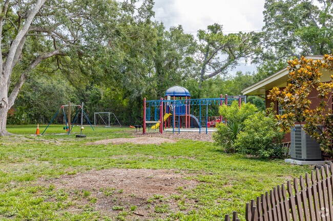 Kids enjoy playing on the play area at Spring Valley School.
