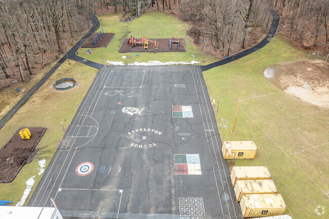 Littleton Elementary School blacktop has the school logo and many activities to partake in.