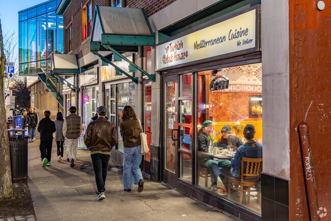 Locals walk to shops and restaurants in the Squirrel Hill Business District.