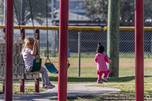 Spring Shadows children love swinging on the swings in Spring Shadows.