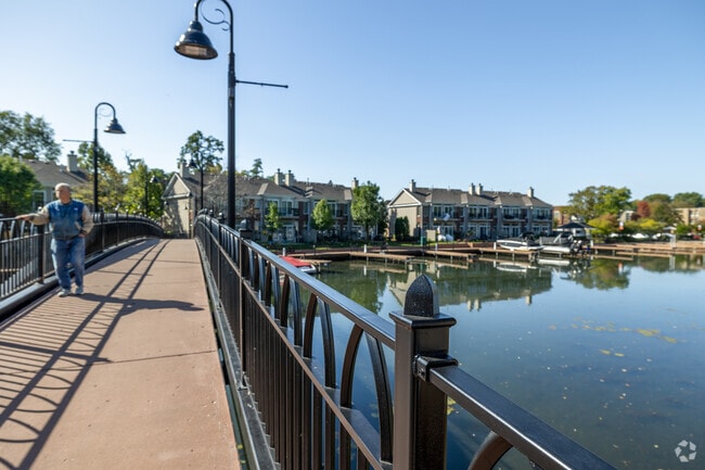 Walking over the bridge to get some fresh air on the McHenry Riverwalk District near Bull Valley.