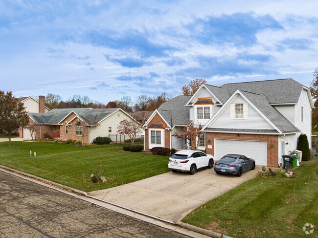 Late 20th century homes with brick facades and large yards are common in in Sippo Heights.