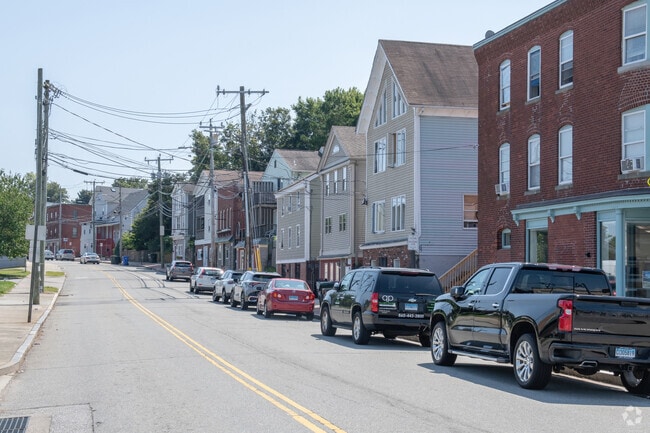 A row of multi-family residences in the Willetts neighborhood echoes city expansion.