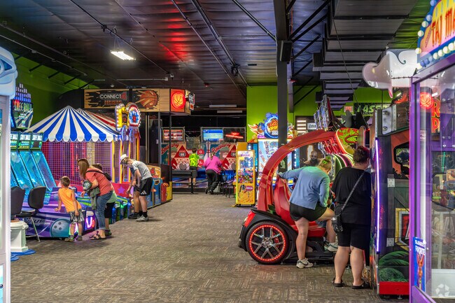 Washington Township residents game the day away at the arcade in Action City.