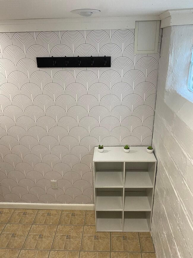 Entryway before unit main door