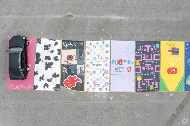 Students show off their art skills in the parking lot at Germantown High School.