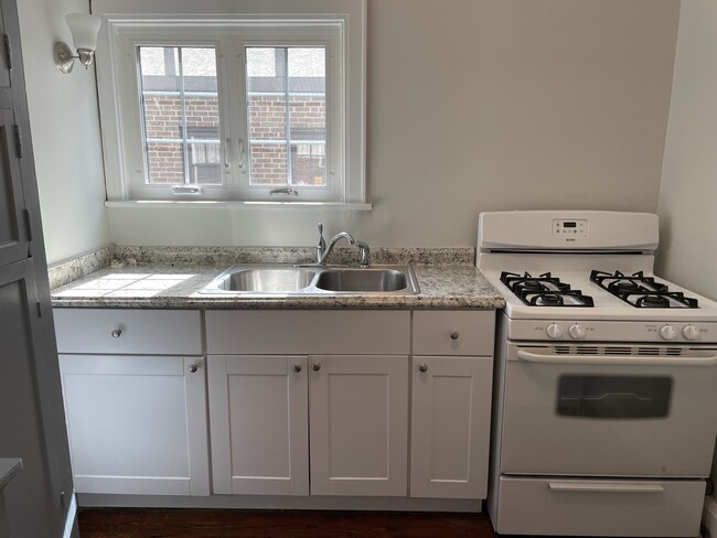 Updated kitchen with range, oven, fridge