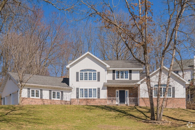 Reedsburg’s large contemporary homes are surrounded by the beauty of dense old-growth trees.