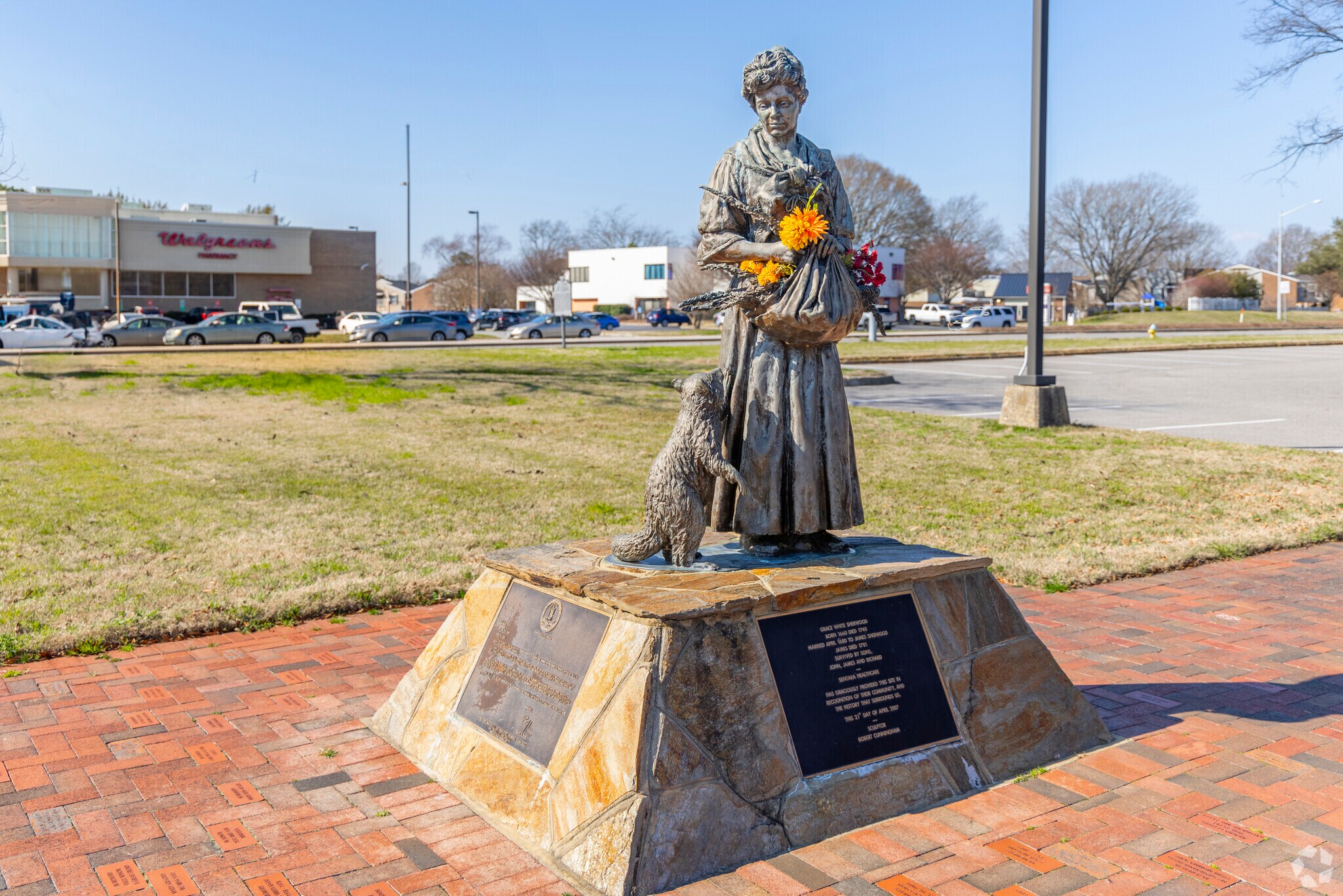 The Grace Sherwood statue in Aragona Village commemorates her legacy as the 'Witch of Pungo'.