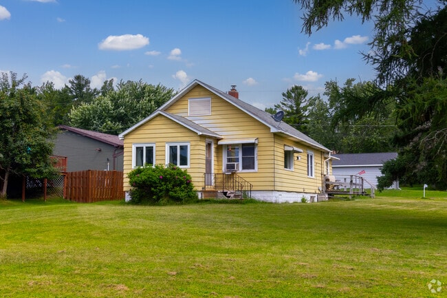 Two Harbors bungalows from the early 1900s line streets near Lake Superior.