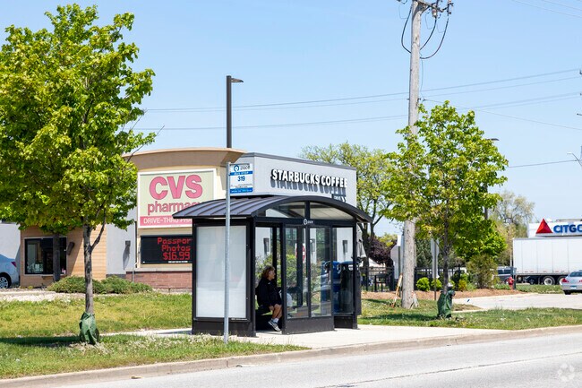 Public transit options in West Grand Ave include the 319 Pace Bus.