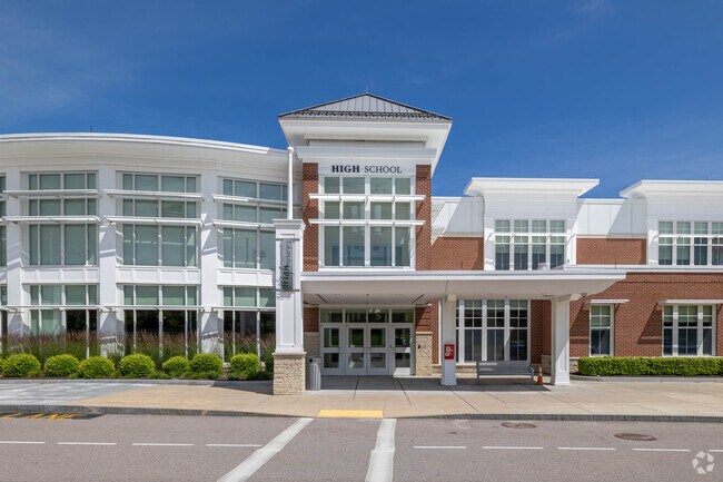 The front entrance of Abington High School is both clean and modern.