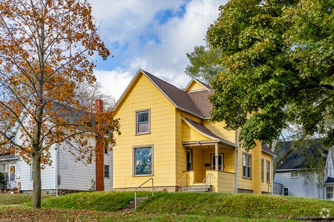 Folk style homes in Poletown often feature colonial revival features and attached porches.