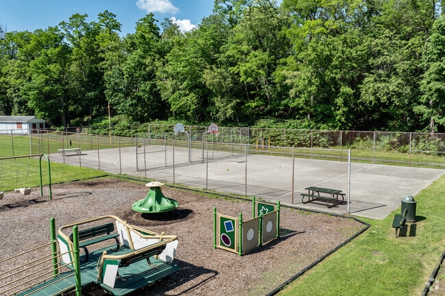 Residents enjoy the basketball courts at Lewis Parklet.