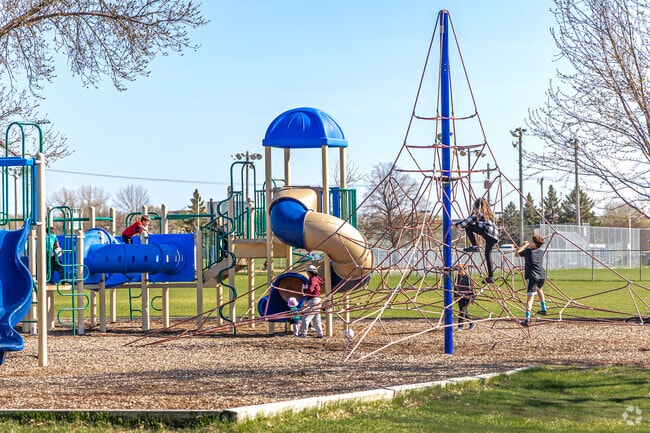 Kids enjoy climbing this unique climbing structure at Commons Park in Fridley.