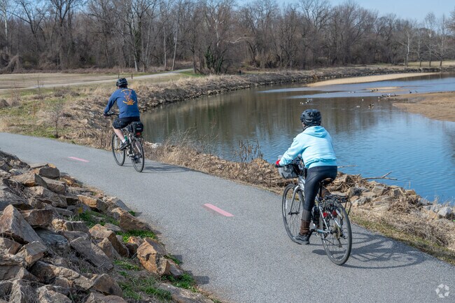 Cyclists bike on the Anacostia River Path which runs through Edmonston.