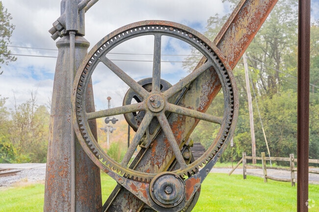 Curtin Village preserves its iron works history through landmarks and local storytelling.