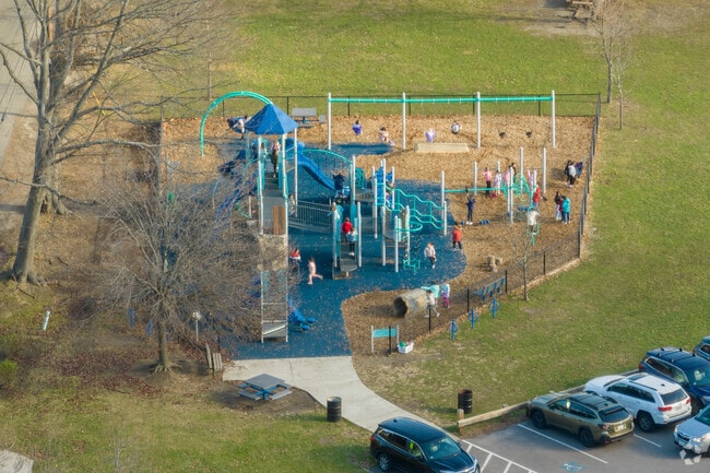 Children enjoy the play structure at Beechwood Knoll Elementary School in Quincy.
