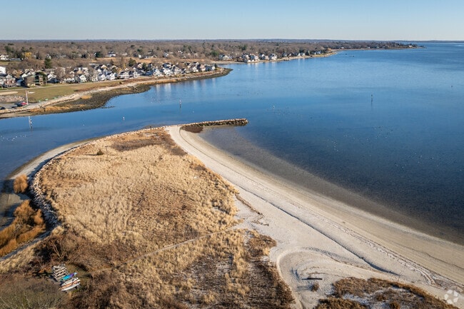 Soak in the panoramic view of Bullock Cove Marine and the peaceful bay in Riverside, RI.