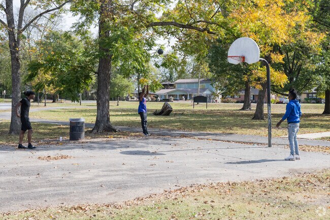 Germania Park is a 20-acre park that features athletic facilities like basketball and tennis.