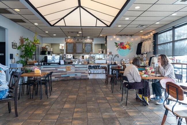 There are several coffee shops located within the Dishman Hills neighborhood.
