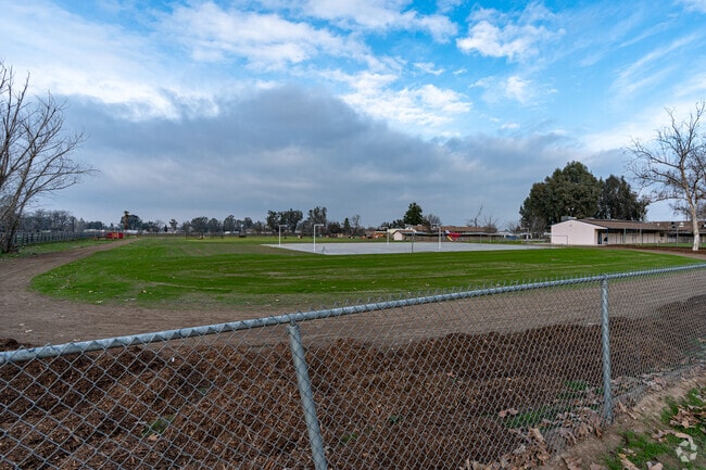 The basketball court and track field are located on the West end at Gideon Apostolic Academy.
