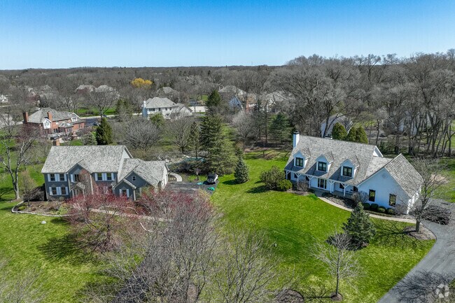 Cottage style homes surround the green spaces and provide serene living in Barrington Hills.