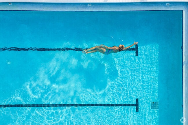 The Polo Trace clubhouse features a dedicated swimming pool for its residents.