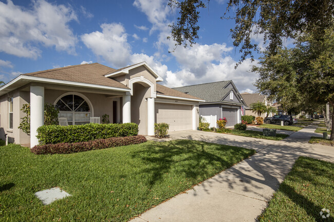 There are many subdivisions in Great Palm River Point with nice lawns and sidewalks.
