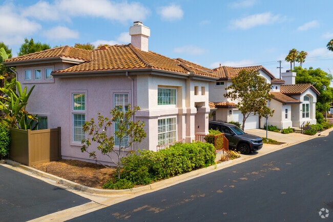Spanish-style homes with tile roofs are common in Carlsbad Village.