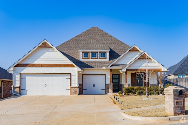 Three-car garage homes are common in the Grove.