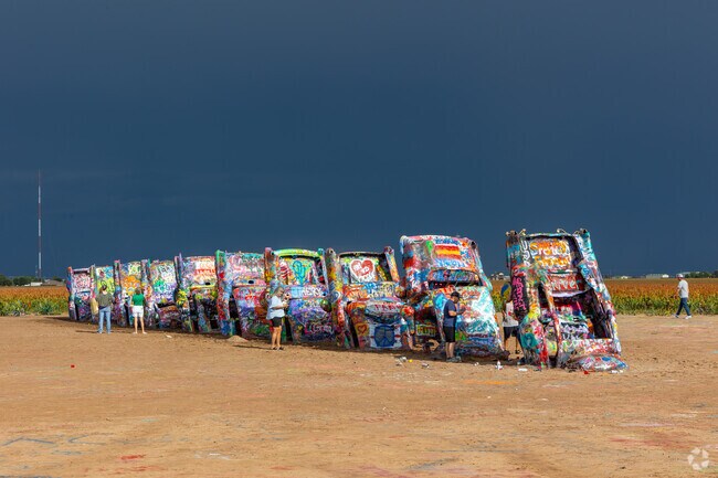 Walnut Hills welcomes tourists and visitors to the Cadillac Ranch.