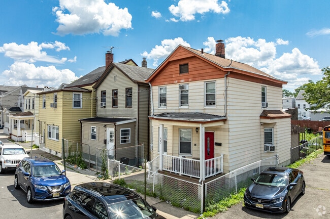 Totowa Section has classic porched homes with fenced yards and welcoming sidewalks.