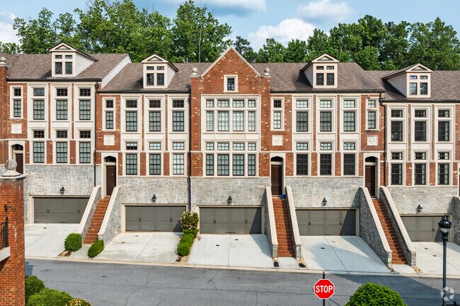 Peachtree Corridor includes townhomes with classic designs, offering upscale living options near schools, parks, and shopping.