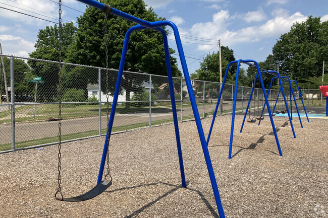 Students at North Hill's Findley Community Learning Center can swing on the many swing sets.