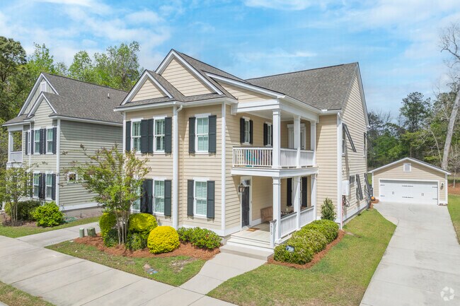 Homes in Carolina Bay feature coastal touches, from shake siding to elevated entries and porches.
