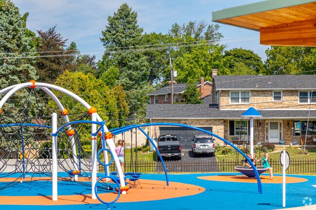 Let the kids tire out on the playground at Violet Hill Park.
