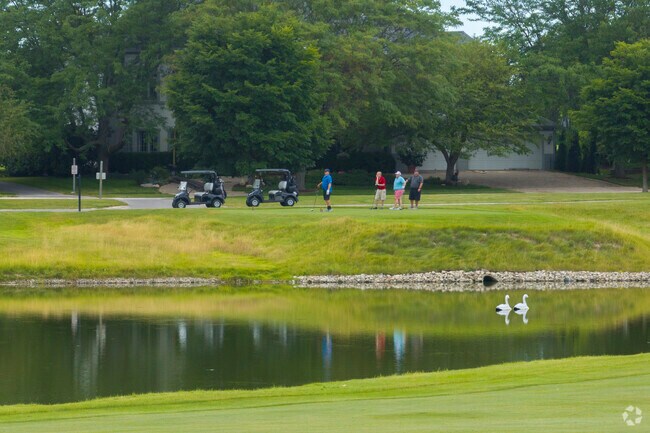 A group of golfers tee off at the White Eagle Golf Club in the White Eagle neighborhood.