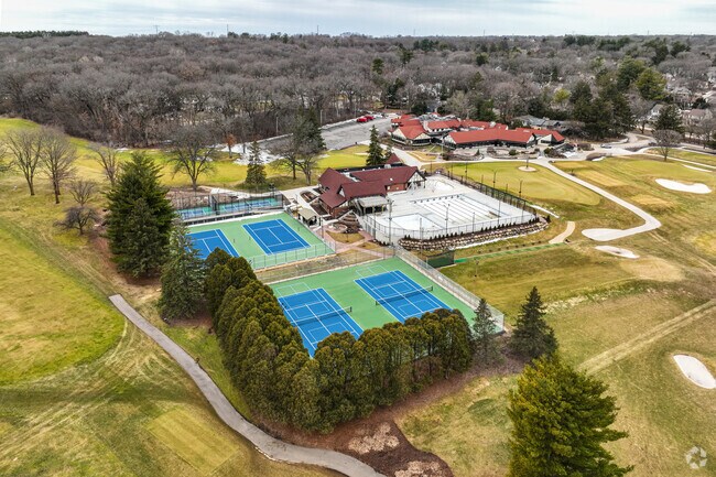 Residents love to play tennis at Nakoma Golf Club.